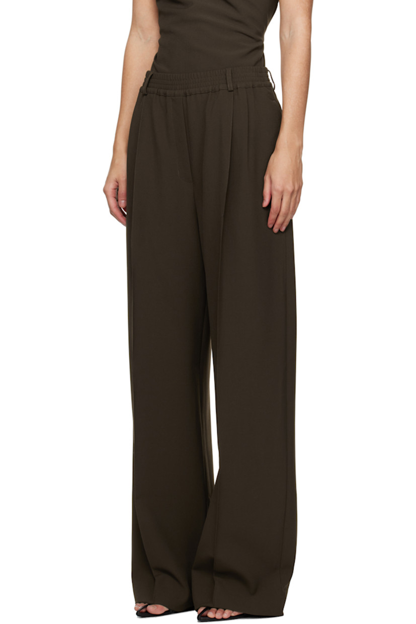 Plain-woven stretch polyester- and viscose-blend trousers.

· Belt loops at elasticized waistband
· Four-pocket styling
· Zip-fly
· Pleats at front
· Creased legs

Supplier color: Dark khaki