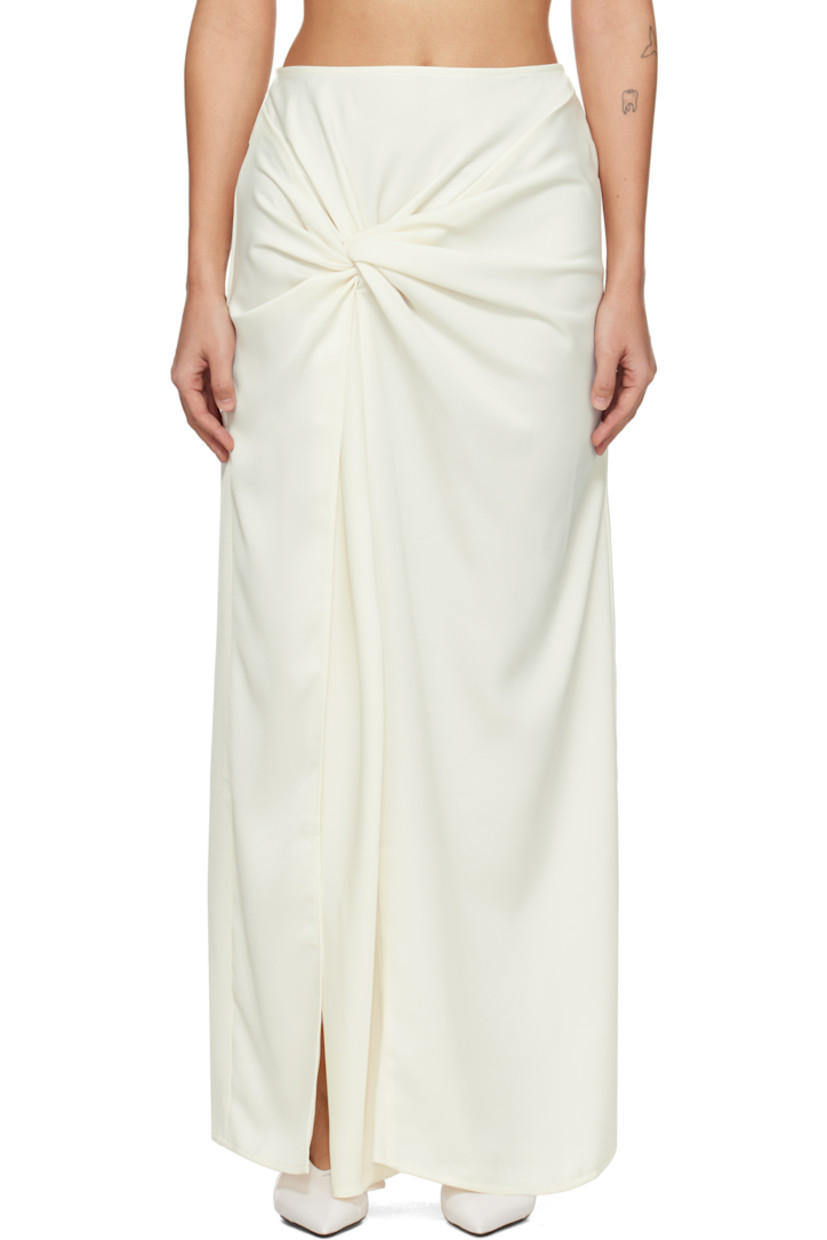 Recycled polyester satin maxi skirt. Draping throughout.

· Twisted detailing at front 
· Slit at front hem
· Concealed zip closure at back
· Unlined 

Supplier color: Porcelain