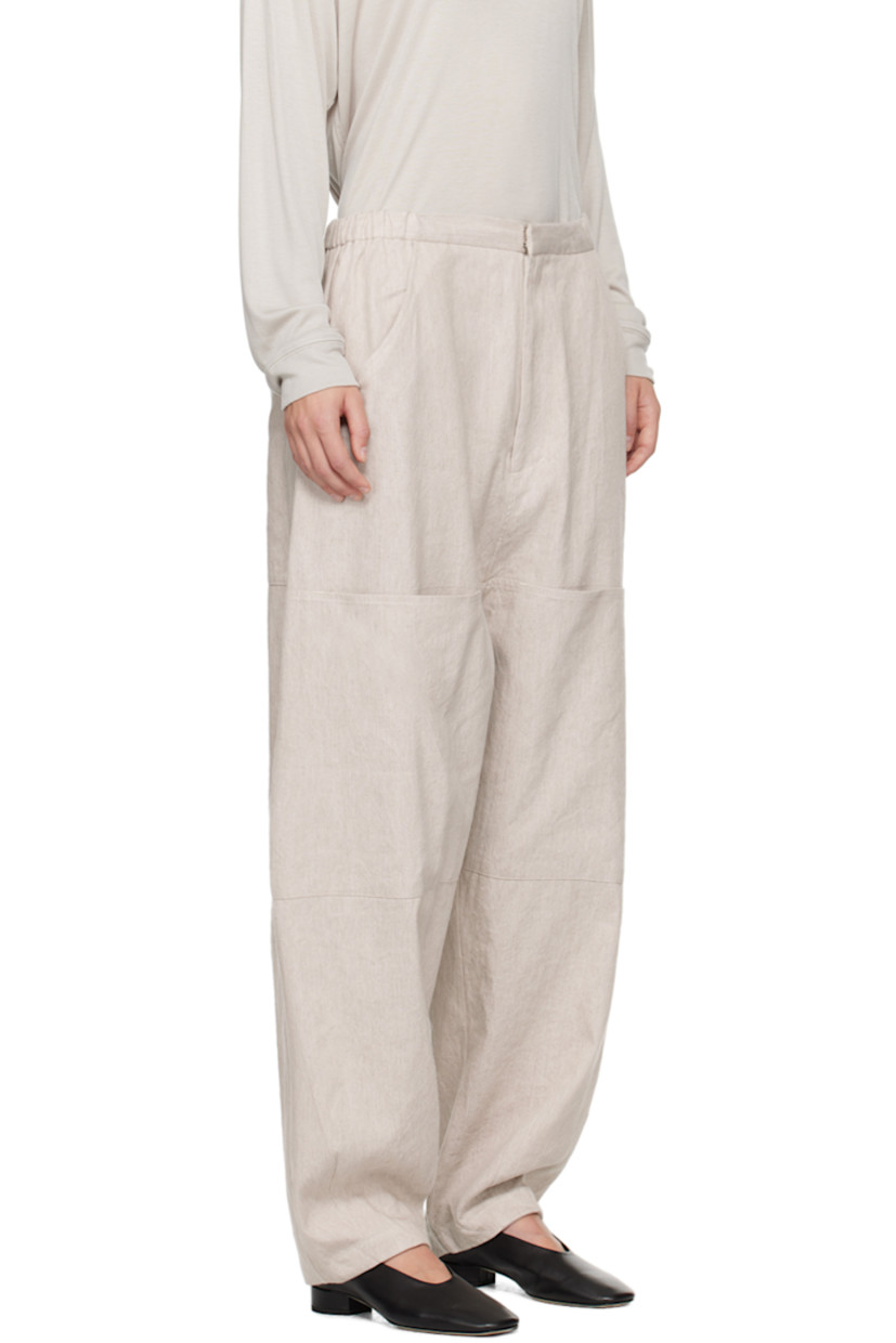 Linen- and cotton-blend twill trousers.

· Concealed drawstring at elasticized waistband
· Four-pocket styling
· Zip-fly
· Patch pocket at knees
· Patch pocket and hammer loop at outseam

Supplier color: Plaster