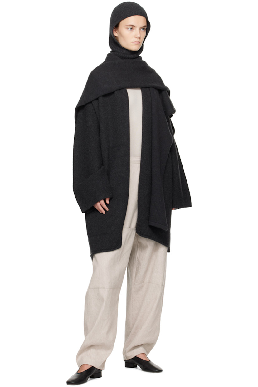 Linen- and cotton-blend twill trousers.

· Concealed drawstring at elasticized waistband
· Four-pocket styling
· Zip-fly
· Patch pocket at knees
· Patch pocket and hammer loop at outseam

Supplier color: Plaster