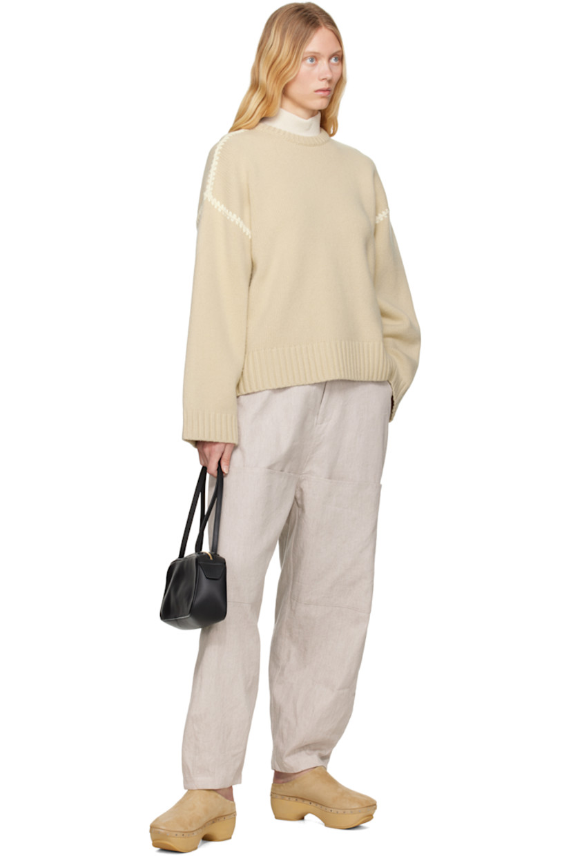 Handcrafted suede slip-on loafers in beige. 

· Logo embossed at padded footbed
· Grained leather lining
· Rivets at welt
· Hand-painted wood block heel and platform midsole
· Crepe rubber sole
· Platform: H1"
· Heel: H2.75"

Supplier color: Sand