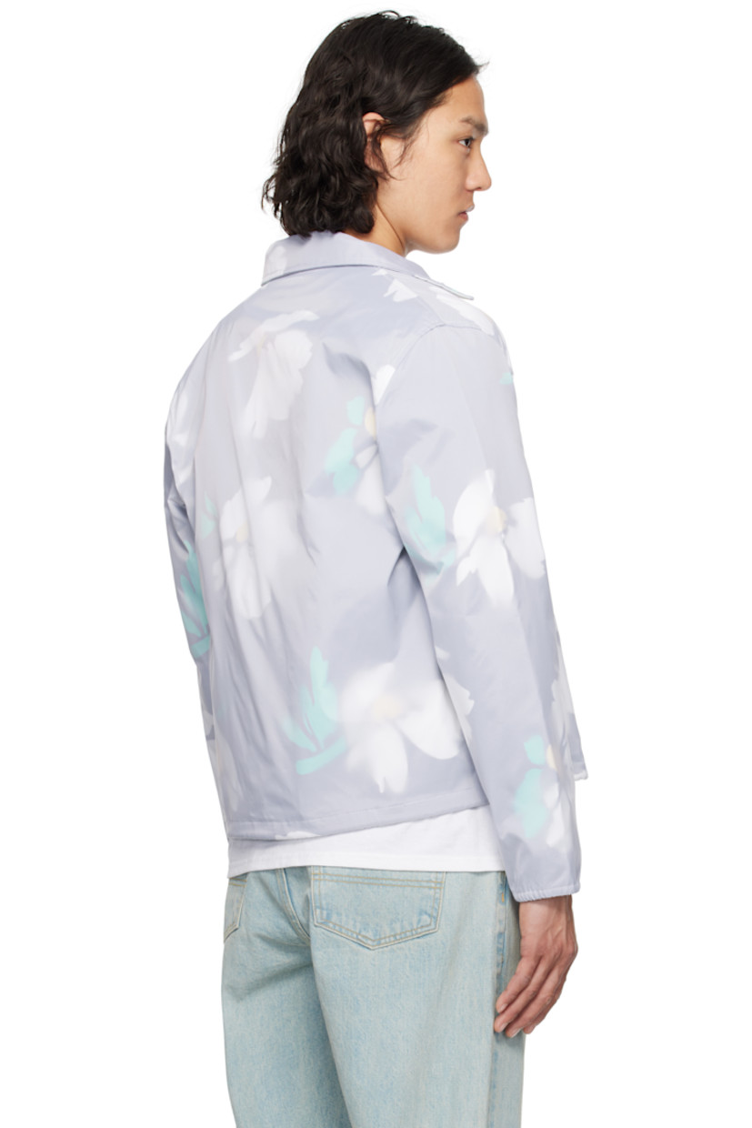 Nylon taffeta jacket. Floral pattern printed throughout.

· Spread collar
· Press-stud closure
· Welt pockets
· Drawstring at hem
· Eyelets at underarms
· Elasticized cuffs
· Logo embroidered at cuff
· Full cotton broken twill lining

Supplier color: White/Multi