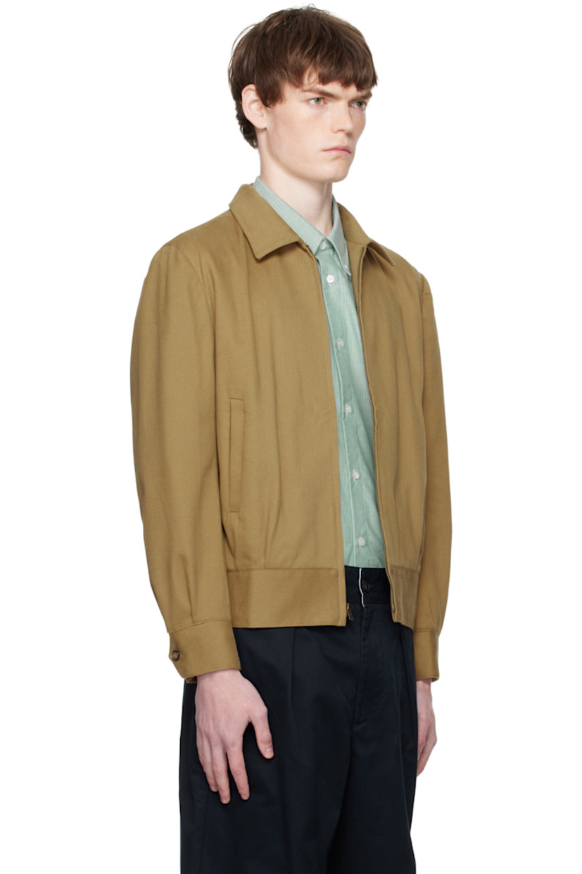 Cotton twill jacket.

· Spread collar
· Zip closure
· Welt pockets at front
· Partially elasticized hem
· Buttoned barrel cuffs
· Pleats at back hem
· Patch pocket at interior
· Full cupro satin lining

Supplier color: Khaki