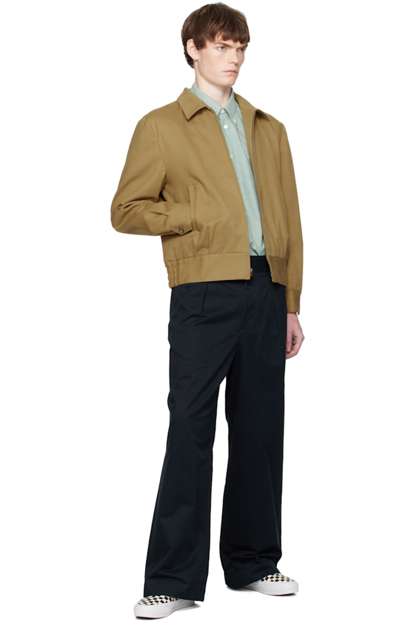 Peached 11.5 oz cotton twill trousers.

· Wide-leg
· Belt loops
· Four-pocket styling
· Zip fly
· Pleats at front

Supplier color: Navy