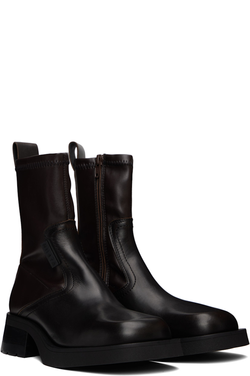 Ankle-high grained leather and faux-leather boots.

· Square toe 
· Rubberized logo flag at vamp
· Zip closure at inner side
· Pull-loop at collar 
· Stacked leather block heel with rubber injection
· Rubber sole
· Heel: H2"

Supplier color: Brown