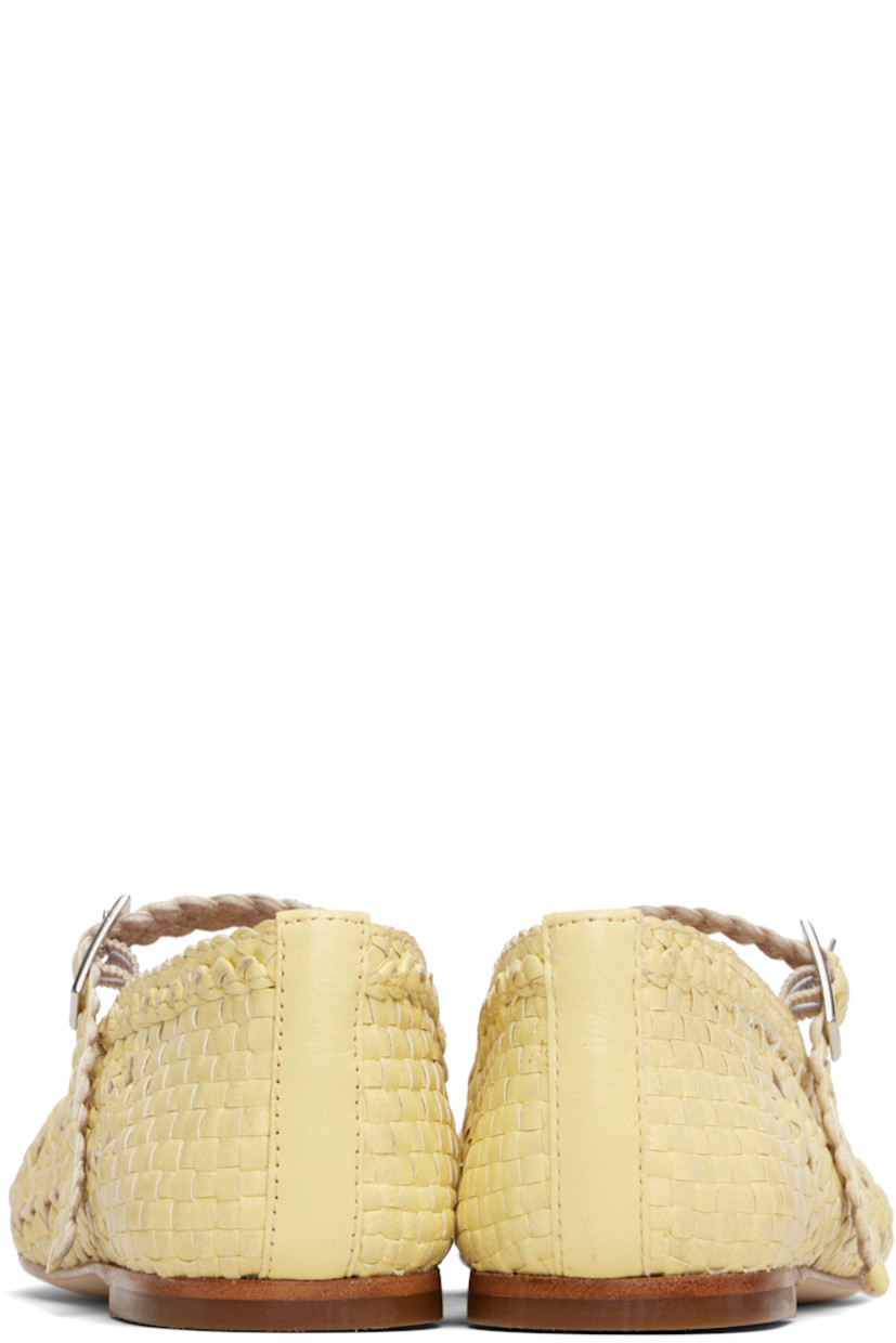 Hand-woven grained leather Mary Jane-style ballerina flats. 

· Square toe 
· Elasticized pin-buckle strap at vamp
· Logo patch at padded footbed
· Unlined
· Leather sole with rubber injections 

Supplier color: Butter