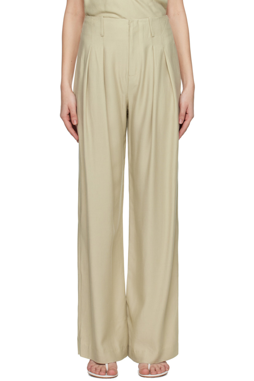 Loose-fit and straight-leg TENCEL™- and nylon-blend twill trousers. 

· High-rise
· Belt loops 
· Two-pocket styling
· Zip fly
· Pleats at front 

Supplier color: Pumice