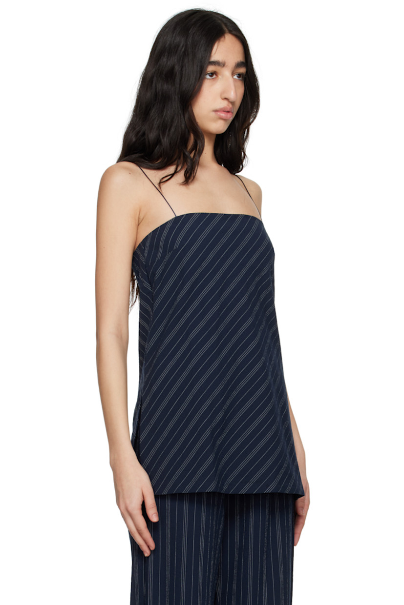 Stretch cotton seersucker top. Stripes throughout. 

· Straight neck
· Darts at chest
· Vented side seams 
· Concealed zip closure at side
· Fixed spaghetti straps
· Tucks at back 
· Integrated bra-style underlay with elasticized hem

Supplier color: Ink/Ivory stripe