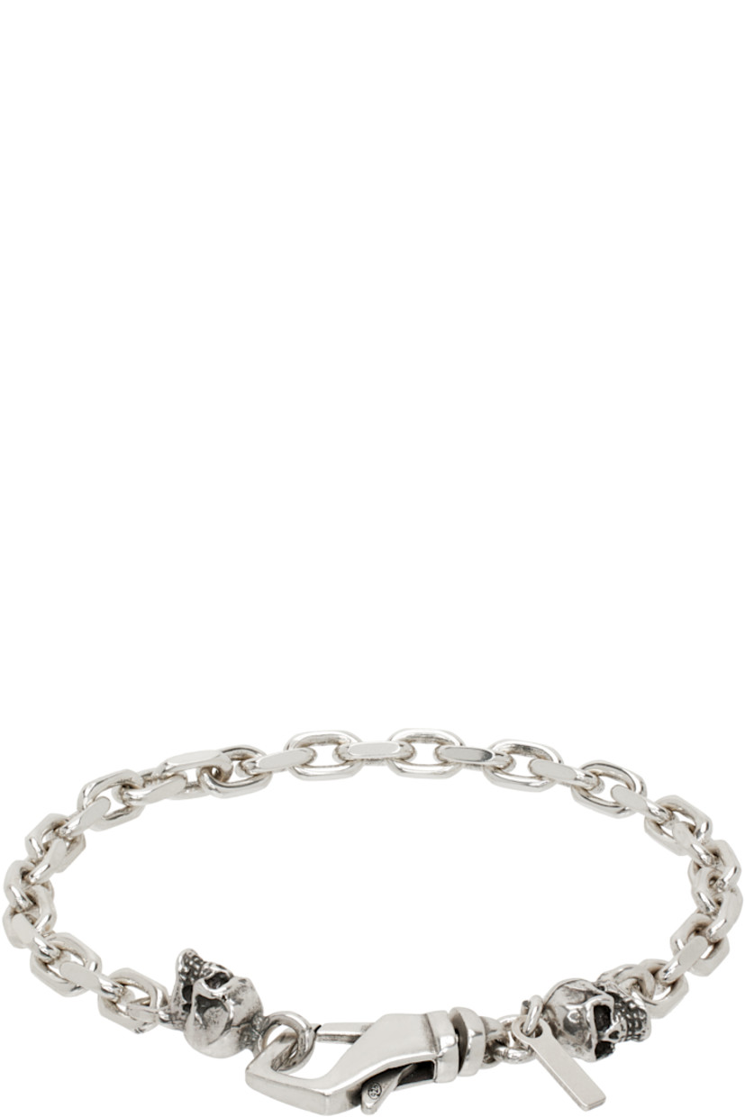 Handcrafted cable chain bracelet in sterling silver. 

· Graphic charms and logo plaque at length
· Lobster-clasp fastening 

Supplier color: Silver