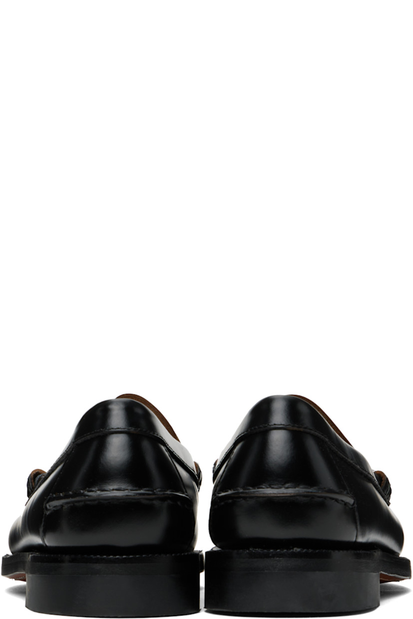 Handcrafted buffed leather loafers in black and white. 

· Moc toe
· Strap with cutout at vamp
· Pinched seam at heel counter
· Molded footbed
· Serrated edge at welt
· Rubber block heel
· Leather sole

Part of the Citysides collection.

Supplier color: Black/White