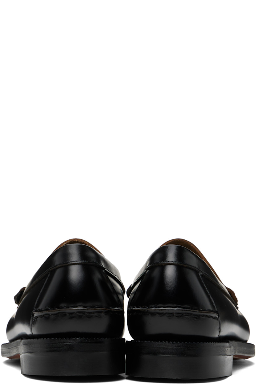 Handcrafted buffed leather loafers in black. 

· Waterproof
· Moc toe 
· Pinched seam at heel counter
· Molded footbed
· Serrated edge at welt
· Rubber block heel
· Leather sole 

Supplier color: Black