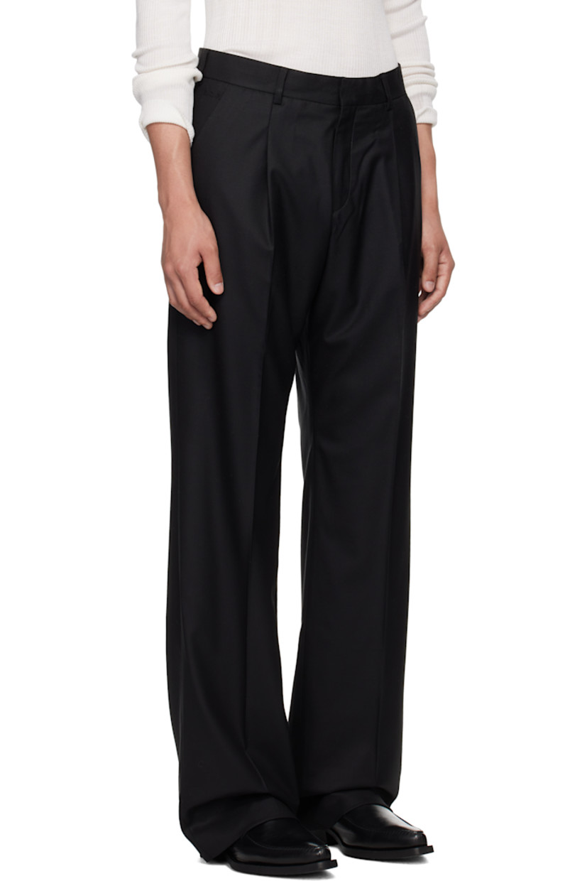 Straight-leg virgin wool twill trousers.

· Belt loops
· Four-pocket styling
· Zip fly
· Creased legs
· Partial viscose satin lining

Supplier color: Black