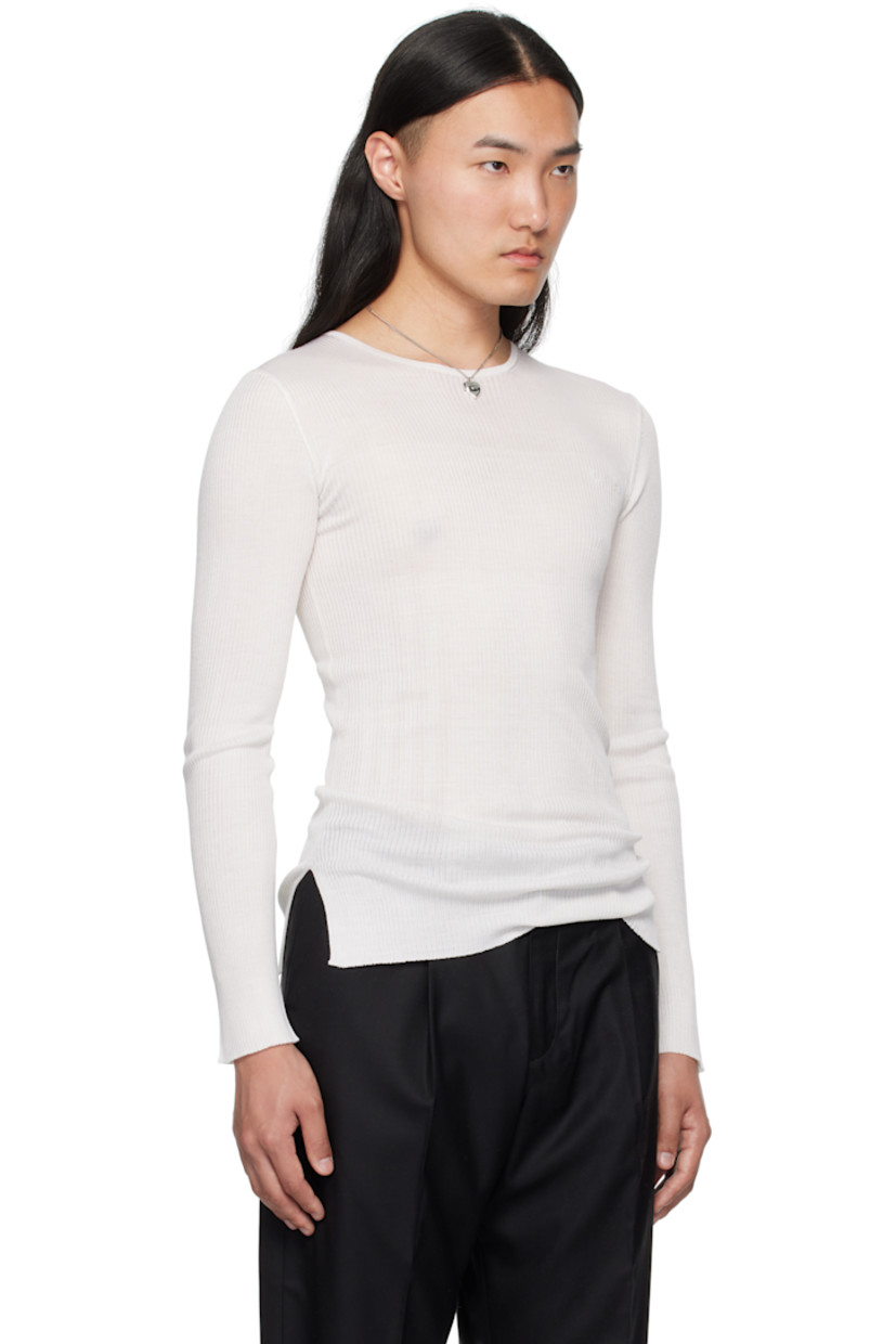 Rib-knit silk- and cashmere-blend sweater.

· Crewneck
· Logo embroidered at chest
· Vented side seams

Supplier color: Ivory