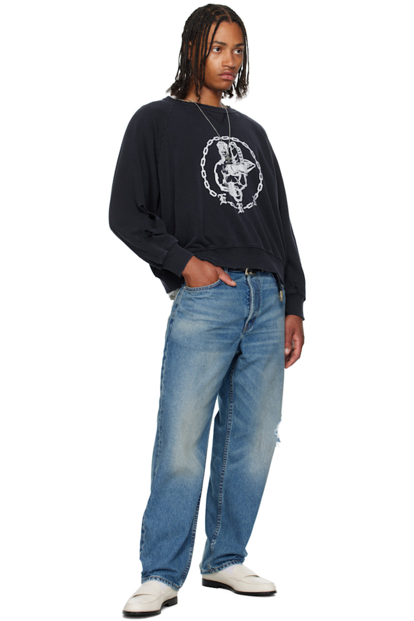 French terry sweatshirt.

· Distressing throughout
· Rib-knit crewneck, hem, and cuffs
· Graphic printed at chest
· Raglan sleeves

Supplier color: Faded purple