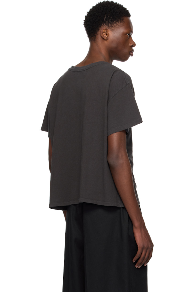 Cotton jersey T-shirt. Fading throughout. 

· Lightweight 
· Rib-knit crewneck
· Graphic and text printed at front 
· Dropped shoulders

Supplier color: Faded black