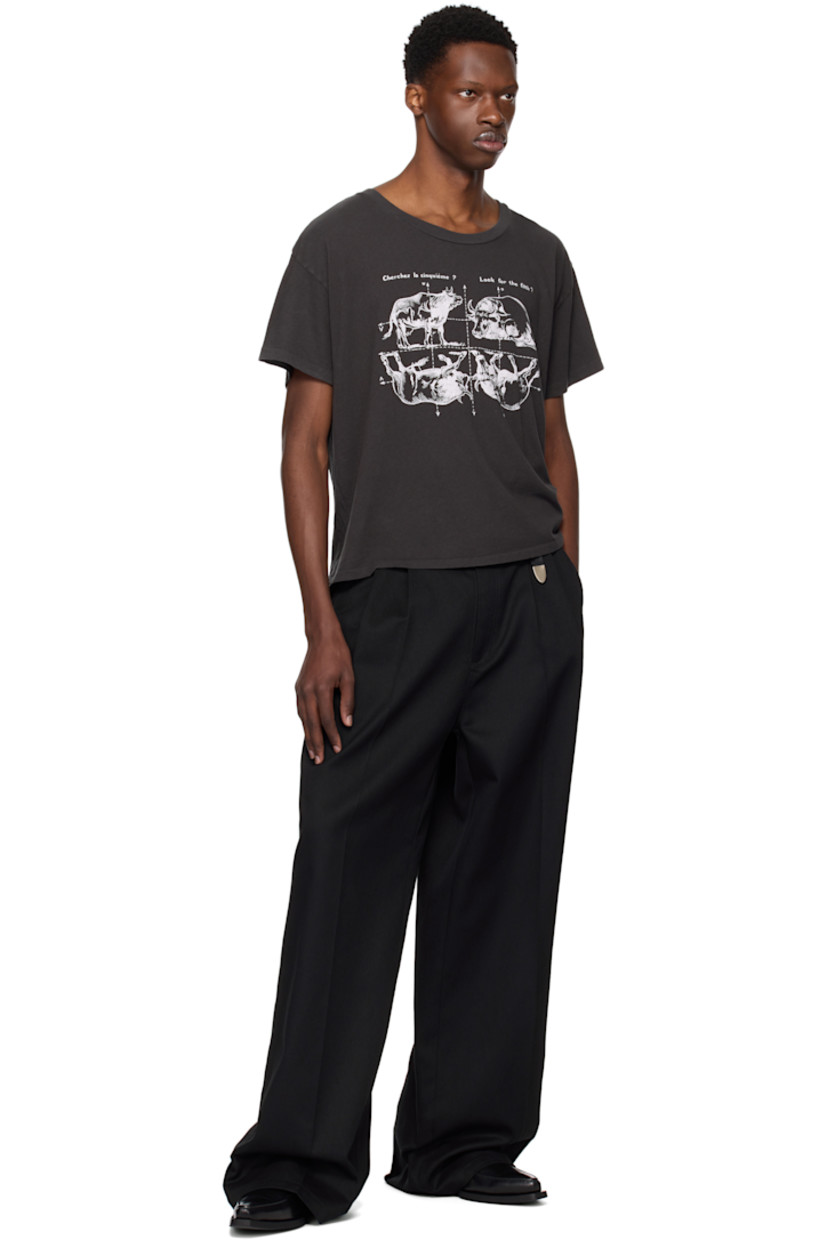 Cotton jersey T-shirt. Fading throughout. 

· Lightweight 
· Rib-knit crewneck
· Graphic and text printed at front 
· Dropped shoulders

Supplier color: Faded black