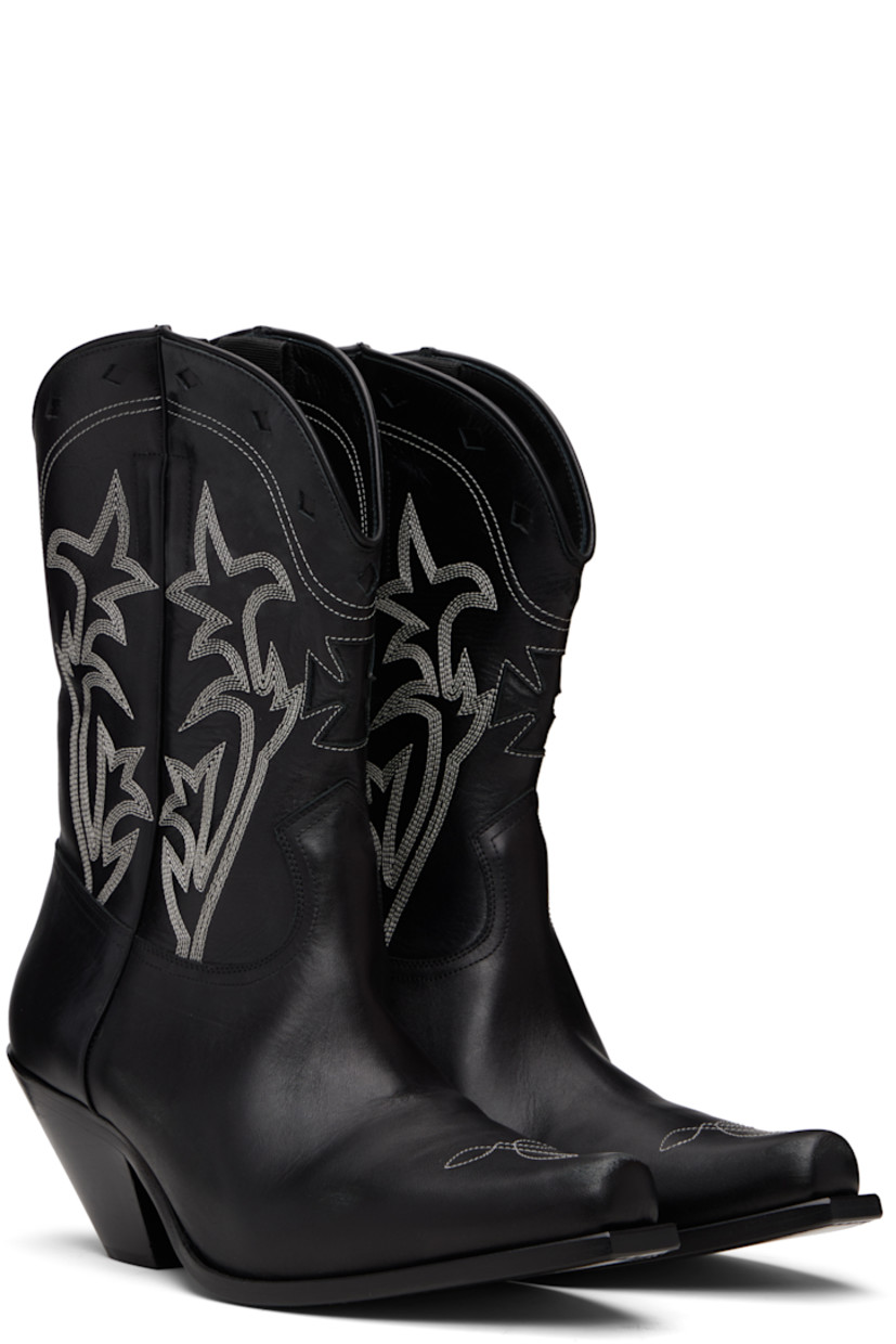 Ankle-high grained calfskin boots.

· Embroidered detailing throughout
· Pointed toe
· Graphic cutouts at vamp and collar
· Concealed pull-loops at collar
· Stacked leather heel with rubber injection
· Leather sole
· Contrast stitching in white
· Heel: H2.5"

Supplier color: Black/Cream
