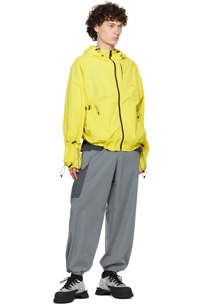 Lightweight nylon ripstop jacket. Bungee-style drawstring at hood, hem, sleeves, cuffs, and back.

· Zip closure
· Logo printed at chest
· Zip pockets
· Elasticized hem and cuffs 
· Raglan sleeves

Supplier color: Citronelle