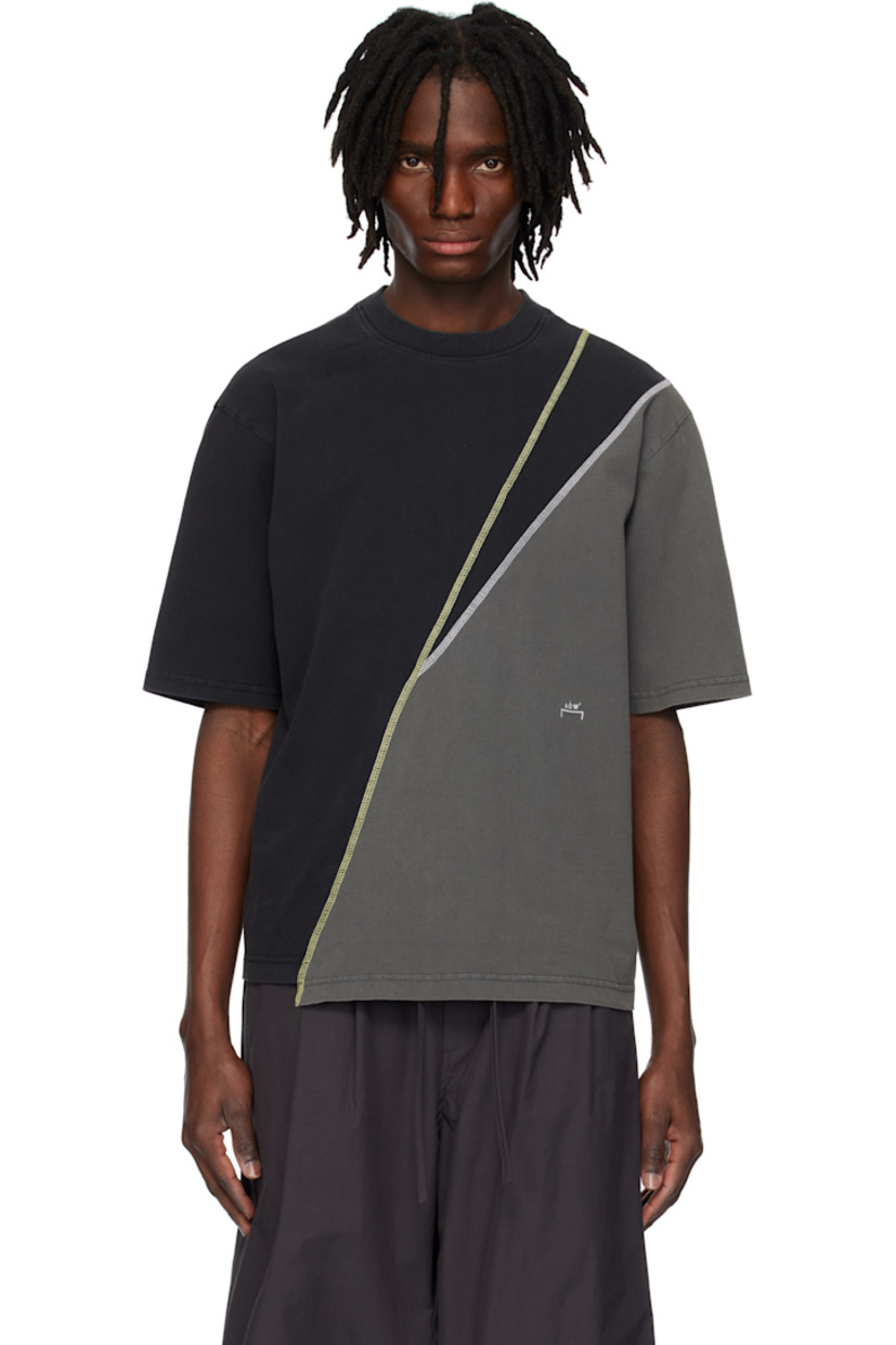 Rinse-washed 210 gsm cotton jersey T-shirt.

· Rib-knit crewneck
· Logo embroidered at front
· Asymmetric hem 
· Dropped shoulders
· Contrast overlock stitching in yellow and white

Supplier color: Black onyx