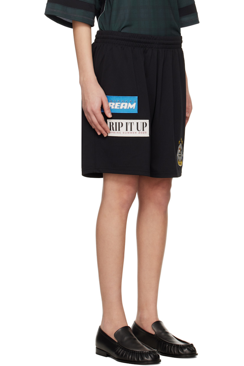 Polyester jersey shorts. 

· Embroidered graphic patches throughout
· Concealed drawstring at elasticized waistband

Supplier color: Black