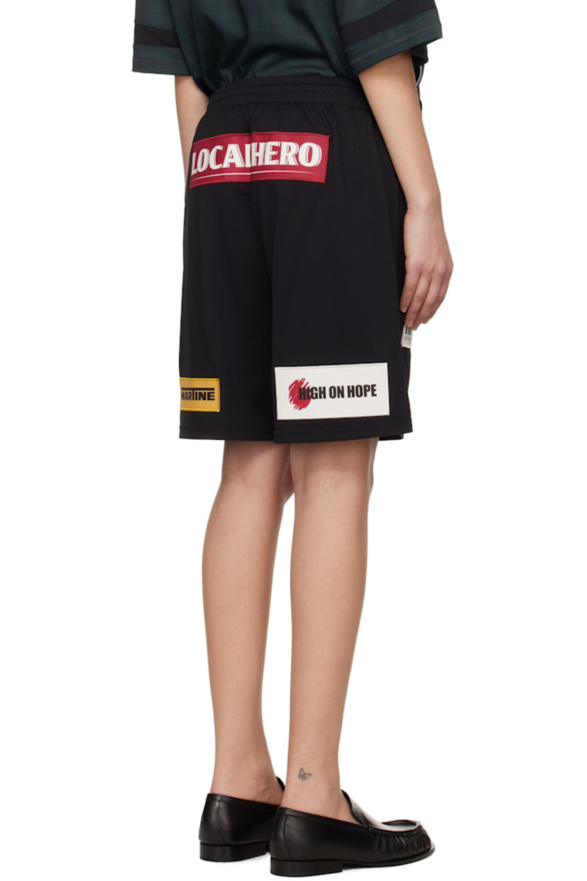 Polyester jersey shorts. 

· Embroidered graphic patches throughout
· Concealed drawstring at elasticized waistband

Supplier color: Black