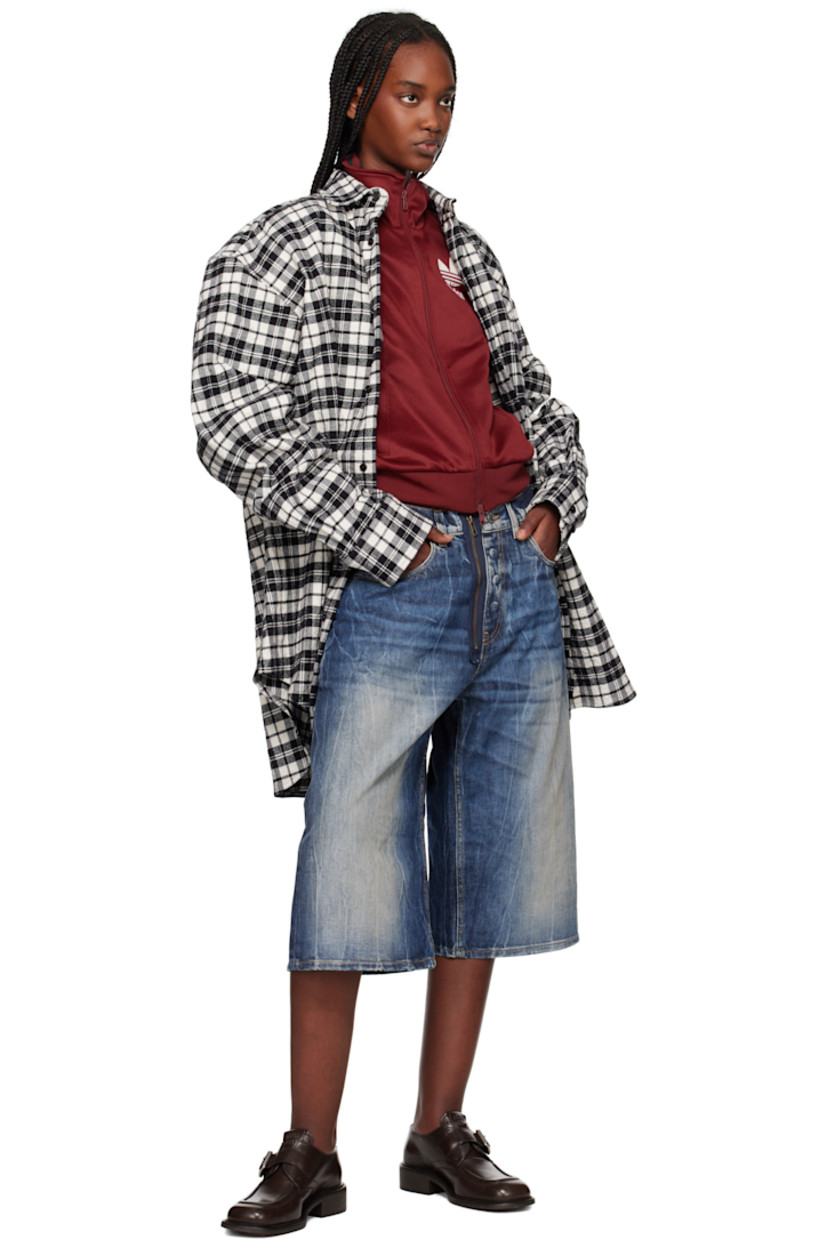 Non-stretch denim shorts. Bleaching, fading, and whiskering throughout. 

· Belt loops
· Five-pocket styling
· Exposed zip-fly
· Logo patch embroidered at coin pocket
· Logo patch at back waistband
· Contrast stitching in tan

Supplier color: Blue