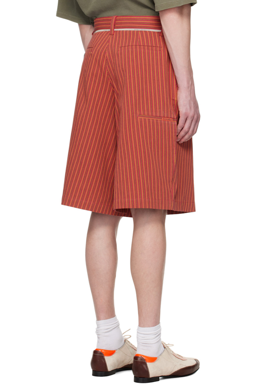 Wide-leg cotton canvas shorts. Stripes throughout. 

· Belt loops and text-woven trim at waistband
· Four-pocket styling
· Zip fly
· Logo embroidered at front
· Modified gusset at inseams
· Logo patch at outseams
· Welt pocket at outseam
· Hammer loop and eyelets at outseam

Supplier color: Red/Yellow stripe