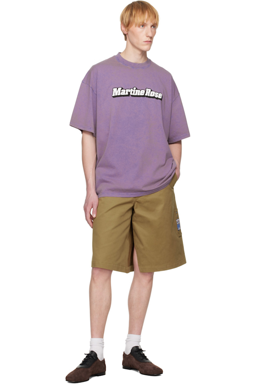 Wide-leg cotton canvas shorts.

· Belt loops and text-woven trim at waistband
· Four-pocket styling
· Zip fly
· Logo embroidered at front
· Modified gusset at inseams
· Logo patch at outseams
· Welt pocket at outseam
· Hammer loop and eyelets at outseam

Supplier color: Beige