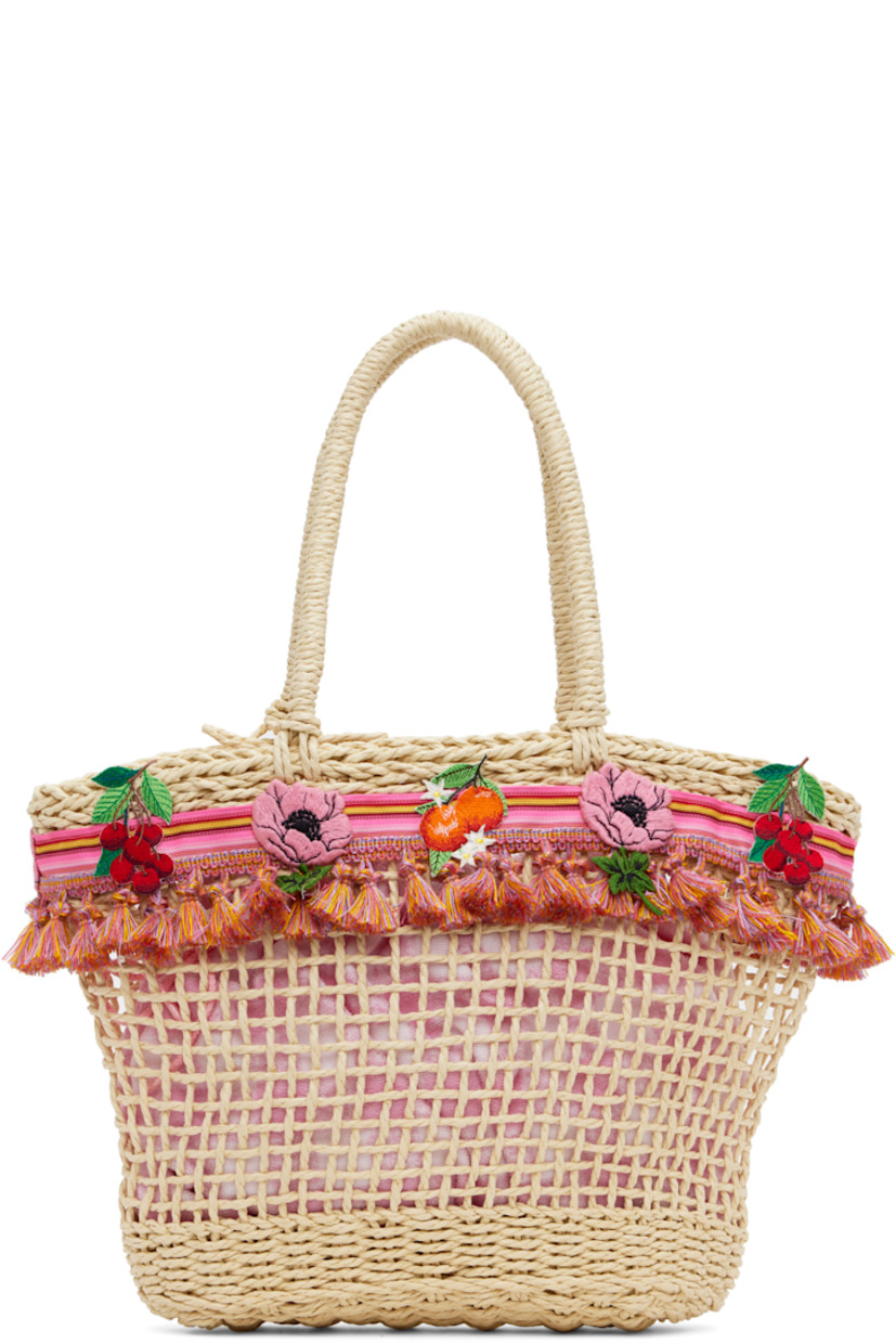 Woven raffia top handle bag in beige. Striped grosgrain trim with tassels and embroidered graphics throughout.

· Fixed carry handles
· Removable pink terrycloth drawstring bag at interior 
· H11" x W14" x D3.5"

Supplier color: Pink