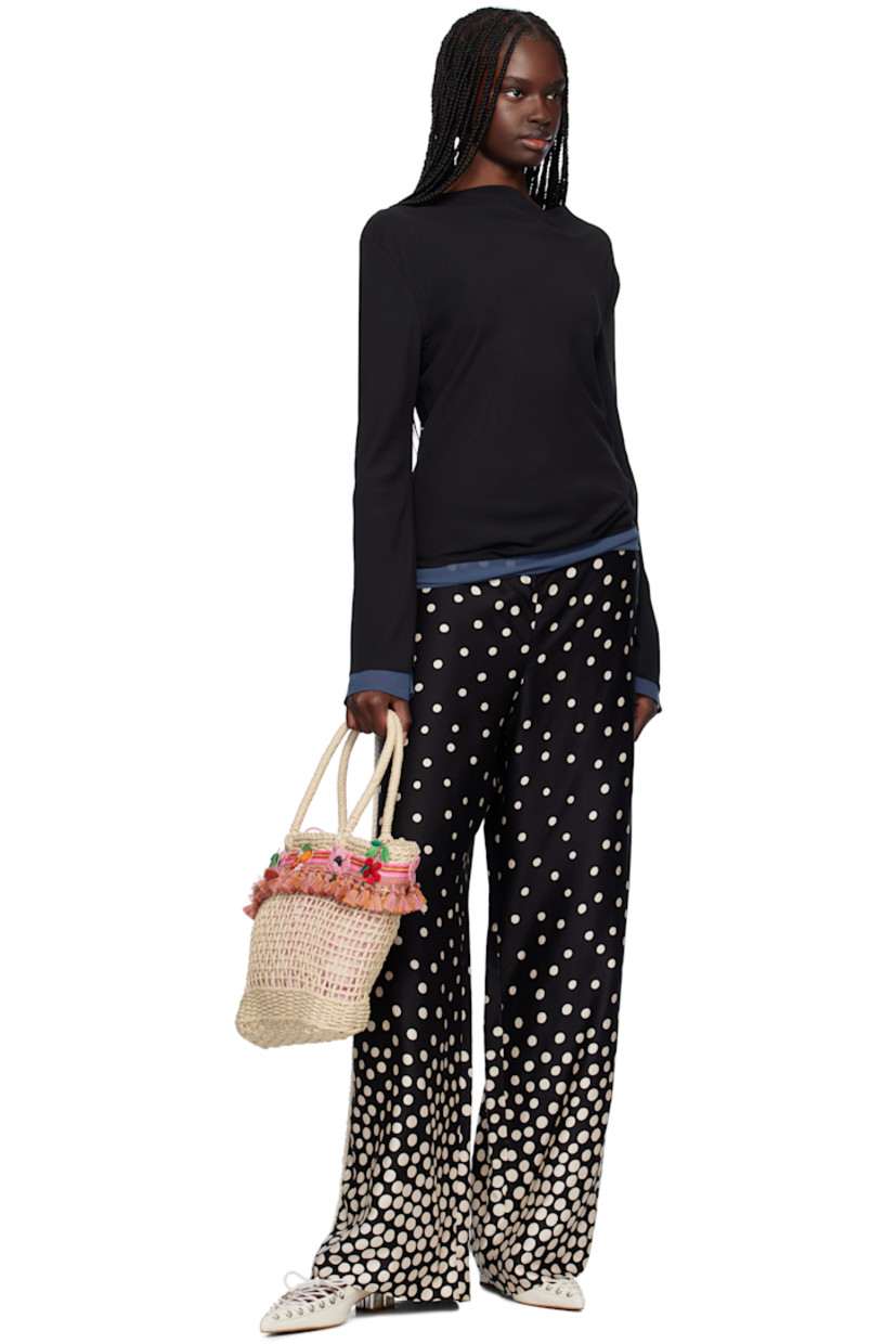 Woven raffia top handle bag in beige. Striped grosgrain trim with tassels and embroidered graphics throughout.

· Fixed carry handles
· Removable pink terrycloth drawstring bag at interior 
· H11" x W14" x D3.5"

Supplier color: Pink