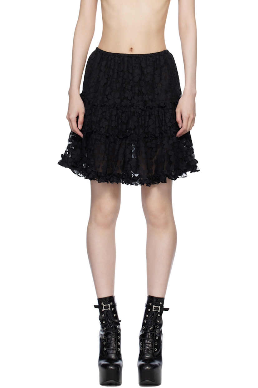 Nylon-blend tulle miniskirt. Floral lace trim and ruffled edges throughout.

· Tiered construction
· Elasticized waistband
· Fully lined

Supplier color: Black