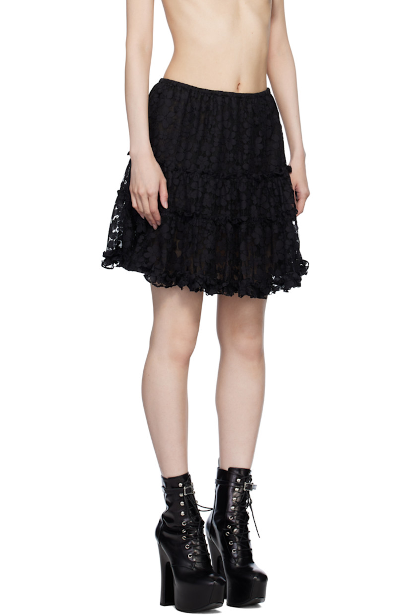 Nylon-blend tulle miniskirt. Floral lace trim and ruffled edges throughout.

· Tiered construction
· Elasticized waistband
· Fully lined

Supplier color: Black