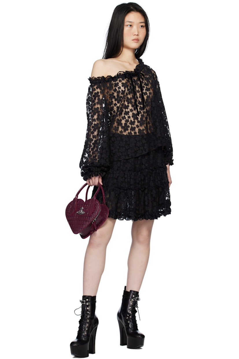 Nylon-blend tulle miniskirt. Floral lace trim and ruffled edges throughout.

· Tiered construction
· Elasticized waistband
· Fully lined

Supplier color: Black