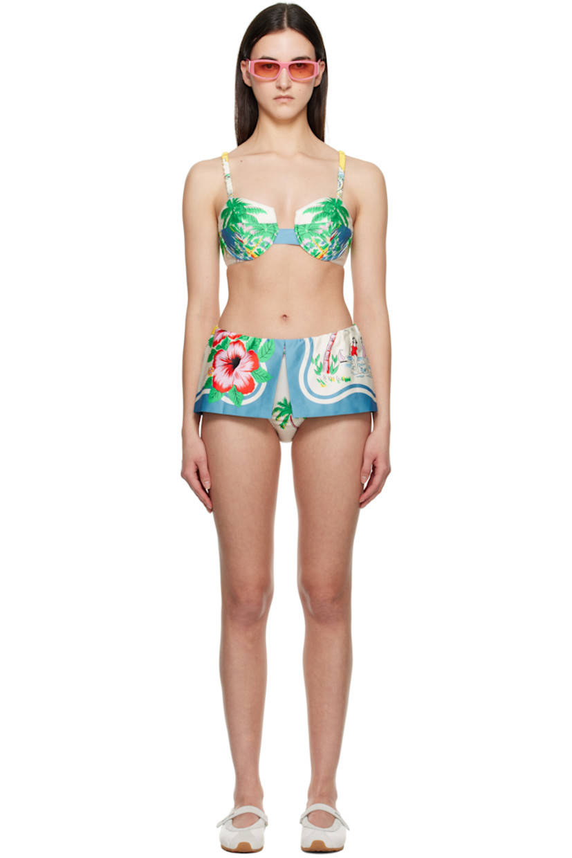 Cotton satin bikini top. Graphic pattern printed throughout.

· Sweetheart neck
· Underwire at cups
· Elasticized spaghetti straps
· Elasticized hook-eye fastening at back
· Full jersey lining

Cotton satin bikini bottom. Graphic pattern printed throughout.

· Foldover elasticized waistband
· Full jersey lining

Supplier color: Blue/Multi