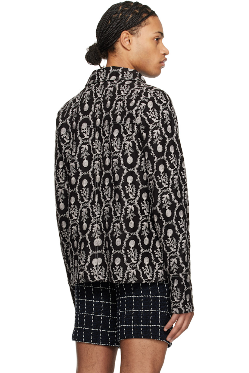 Faux-suede jacket. Embroidered floral pattern throughout.

· Spread collar
· Button closure
· Western yoke at front and back
· Welt pockets
· Single-button barrel cuffs
· Unlined
· Contrast stitching in white

Supplier color: Black