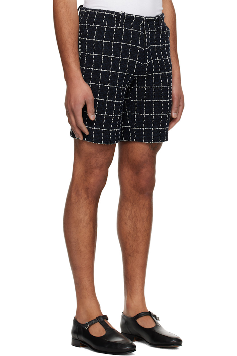 Cotton-blend tweed shorts. Check pattern throughout.

· Belt loops
· Four-pocket styling
· Zip-fly

Supplier color: Denim