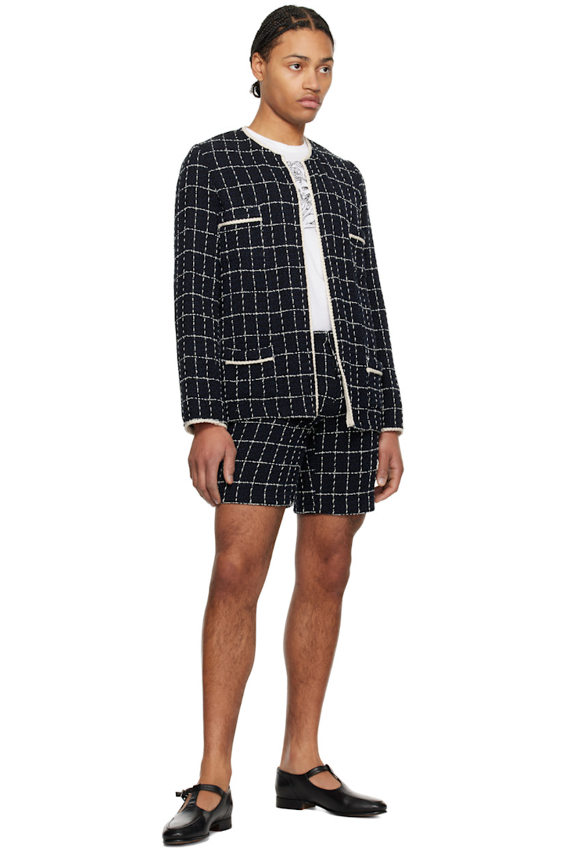 Cotton-blend tweed shorts. Check pattern throughout.

· Belt loops
· Four-pocket styling
· Zip-fly

Supplier color: Denim