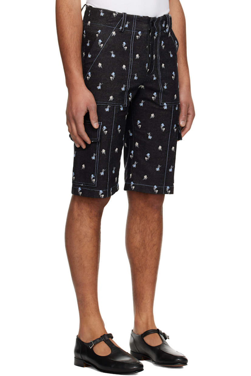 Non-stretch denim shorts. Floral pattern embroidered throughout.

· Paneled construction
· Belt loops
· Two-pocket styling
· Zip-fly
· Cargo pocket at outseams
· Contrast stitching in blue

Supplier color: Denim