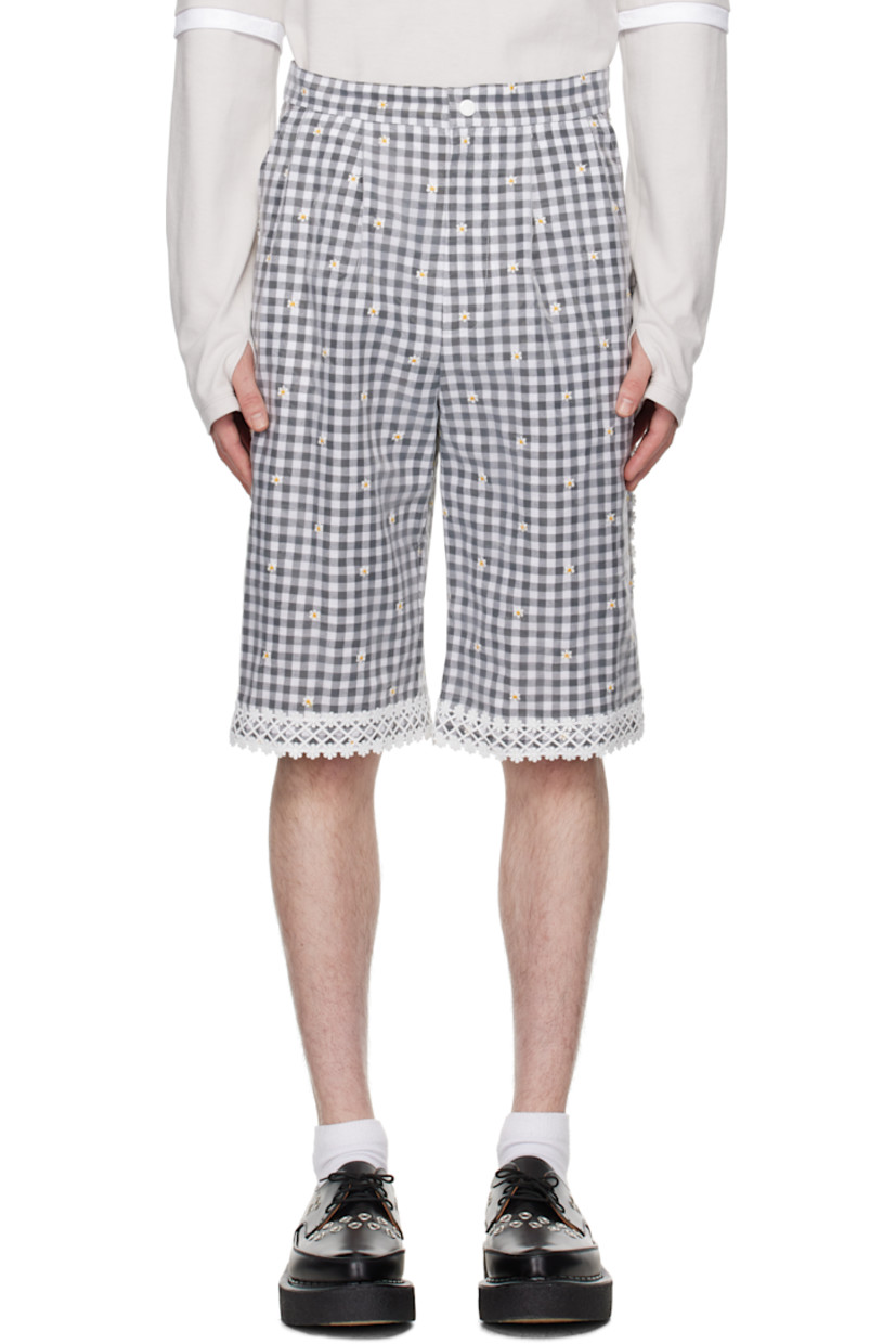 Plain-woven polyester shorts. Lace trim, gingham pattern, and embroidered floral pattern throughout.

· Chiffon overlay
· Two-pocket styling
· Zip fly
· Pleats at front 

Available exclusively at SSENSE.

Supplier color: Black/Multi