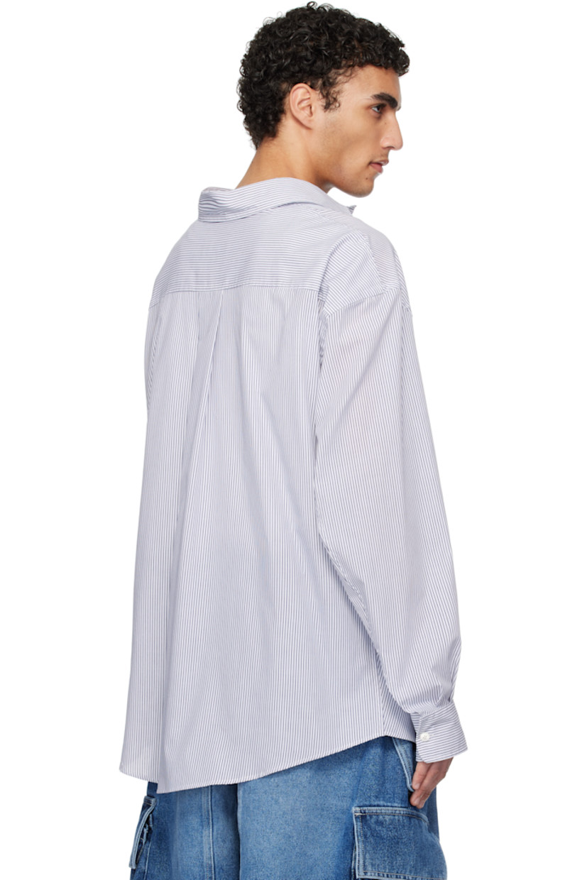 Polyester- and cotton-blend poplin shirt. Stripe pattern throughout.

· Spread collar
· Button closure
· Asymmetric hem
· Buttoned barrel cuffs
· Box pleat at back yoke

Supplier color: Natural