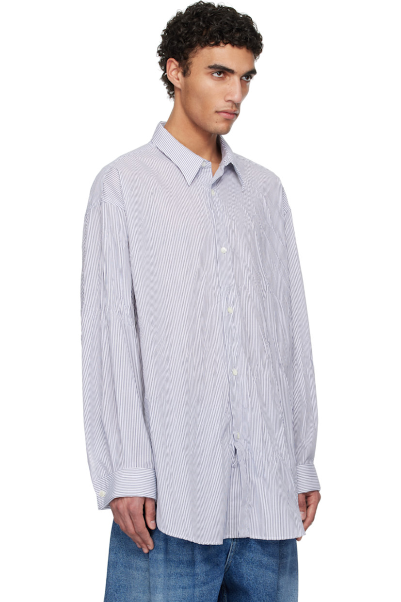 Crinkled polyester- and cotton-blend poplin shirt. Stripe pattern throughout.

· Spread collar
· Button closure
· Shirttail hem
· Buttoned French cuffs
· Box pleat at yoke

Supplier color: Natural