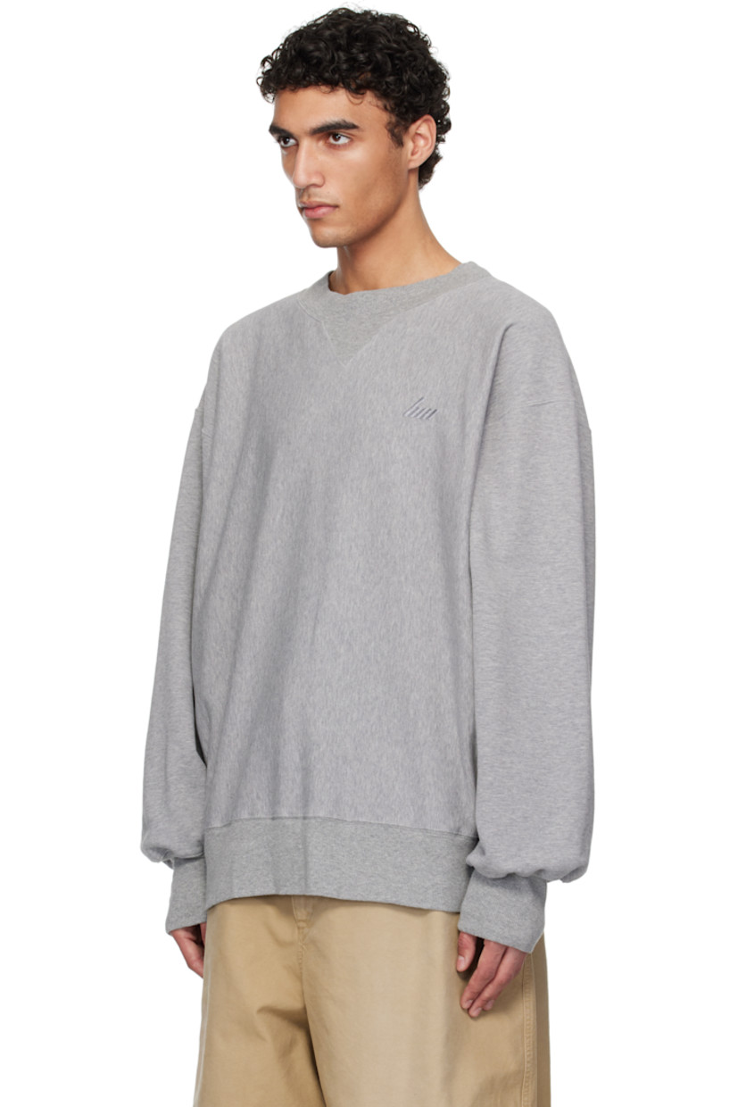French terry sweatshirt.

· Rib-knit crewneck, hem, and cuffs
· Logo embroidered at chest
· Dropped shoulders

Supplier color: Medium grey
