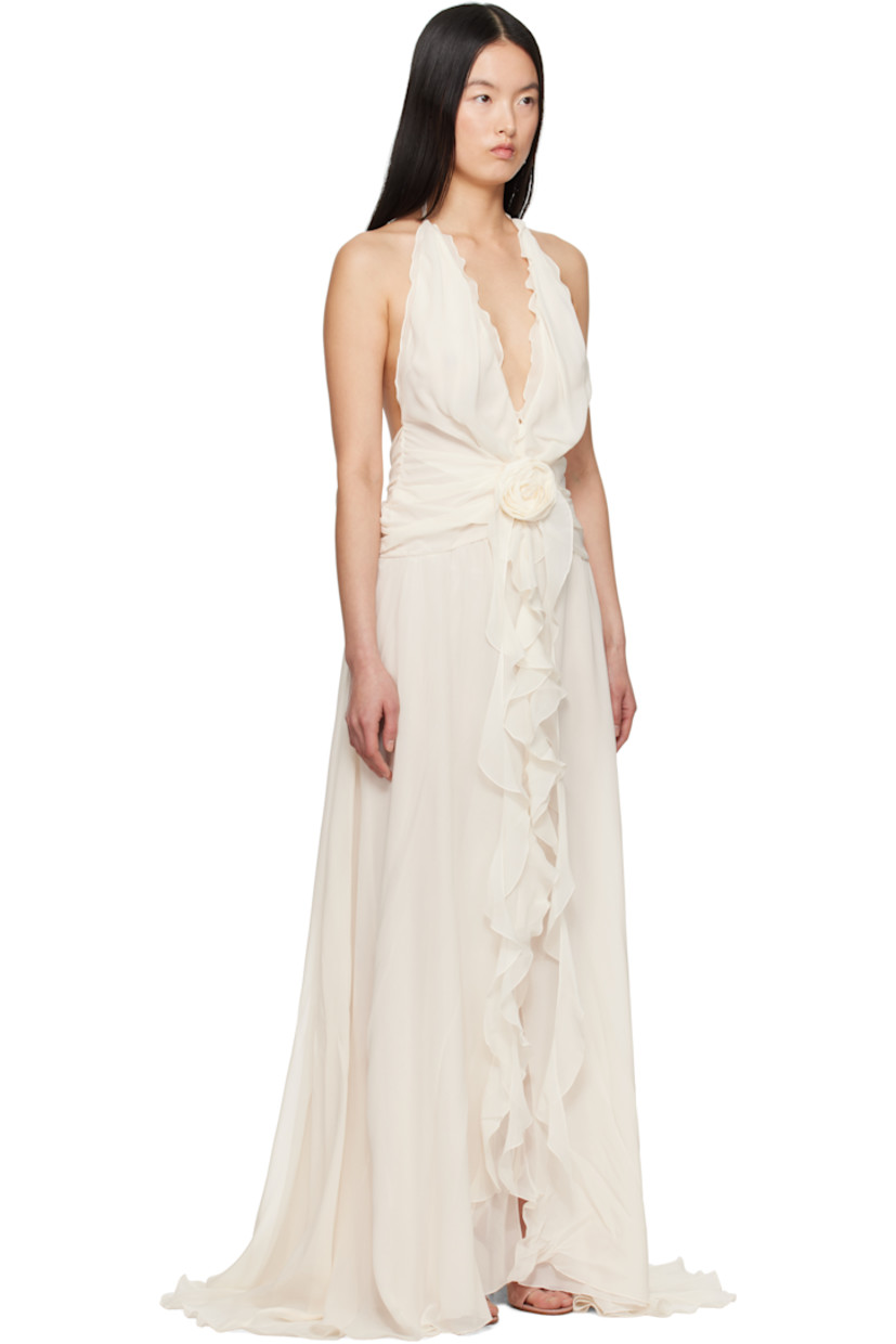 Semi-sheer silk georgette maxi dress. Ruffled trim throughout.

· Plunging self-tie halter neck
· Floral appliqué and extended trim at front
· Self-tie fastening at low back
· Full crêpe lining

Supplier color: Butter