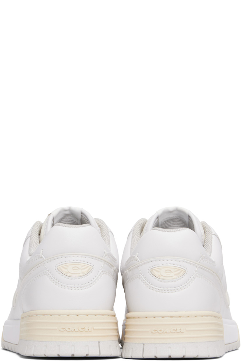 Low-top buffed leather sneakers.

· Perforated detailing at toe
· Lace-up closure
· Logo patch at padded tongue
· Padded collar
· Logo appliqué at outer side and heel counter
· Mesh lining
· Treaded rubber sole

Supplier color: Optic white