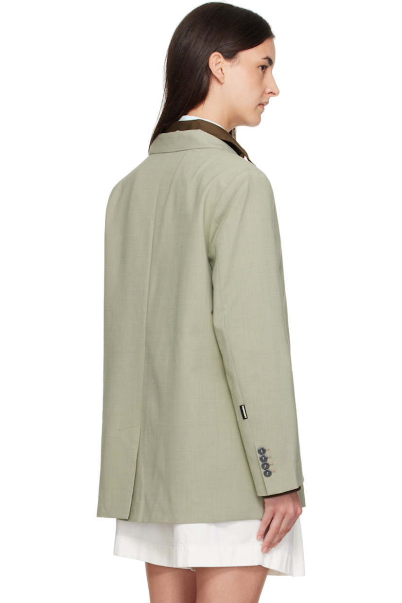 Woven stretch virgin wool-blend blazer.

· Peaked lapel
· Two-button closure
· Welt pockets at chest and waist
· Buttoned surgeon's cuffs
· Vented back hem
· Full satin lining
· Black metal hardware

Supplier color: Salvia