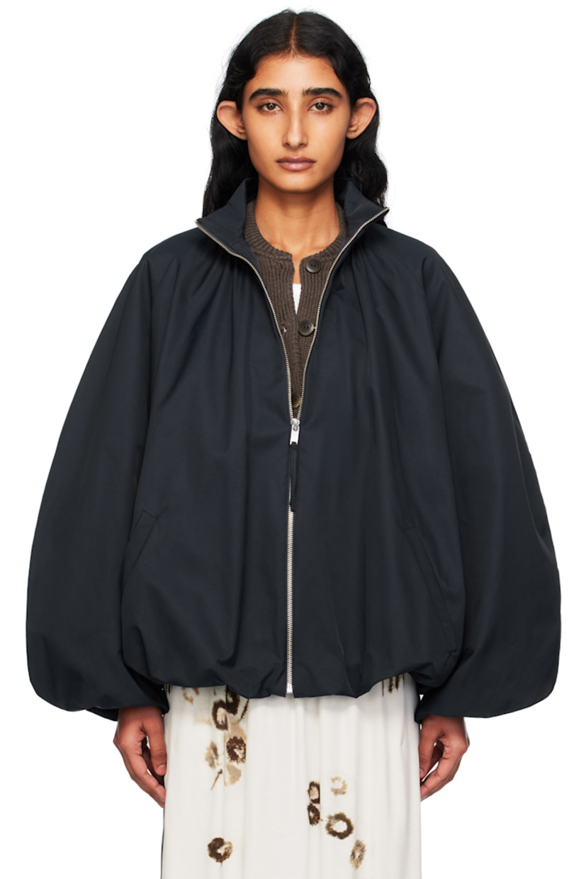 Coated cotton-blend twill jacket. 

· Ballooned construction
· Water-repellent
· ZDHC-certified
· Stand collar
· Zip closure
· Welt pockets at waist
· Raglan sleeves
· Gathering at back
· Full satin lining

Supplier color: Navy