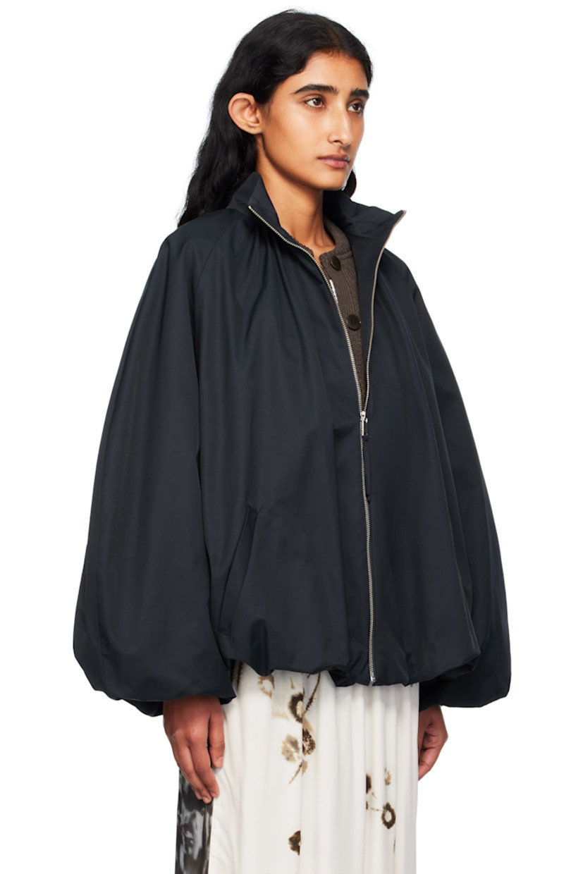 Coated cotton-blend twill jacket. 

· Ballooned construction
· Water-repellent
· ZDHC-certified
· Stand collar
· Zip closure
· Welt pockets at waist
· Raglan sleeves
· Gathering at back
· Full satin lining

Supplier color: Navy