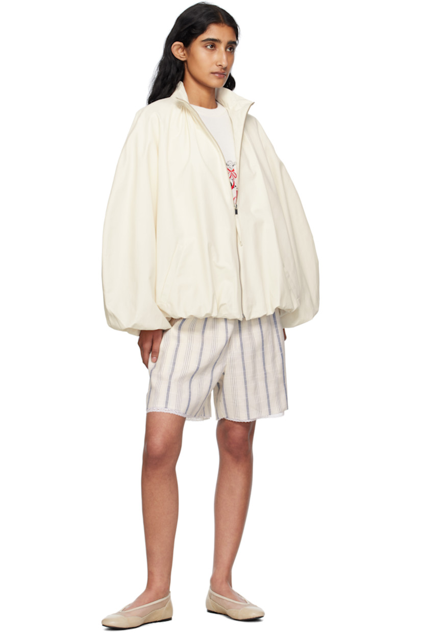 Coated cotton-blend twill jacket. 

· Ballooned construction
· Water-repellent
· ZDHC-certified
· Stand collar
· Zip closure
· Welt pockets at waist
· Raglan sleeves
· Gathering at back
· Full satin lining

Supplier color: White
