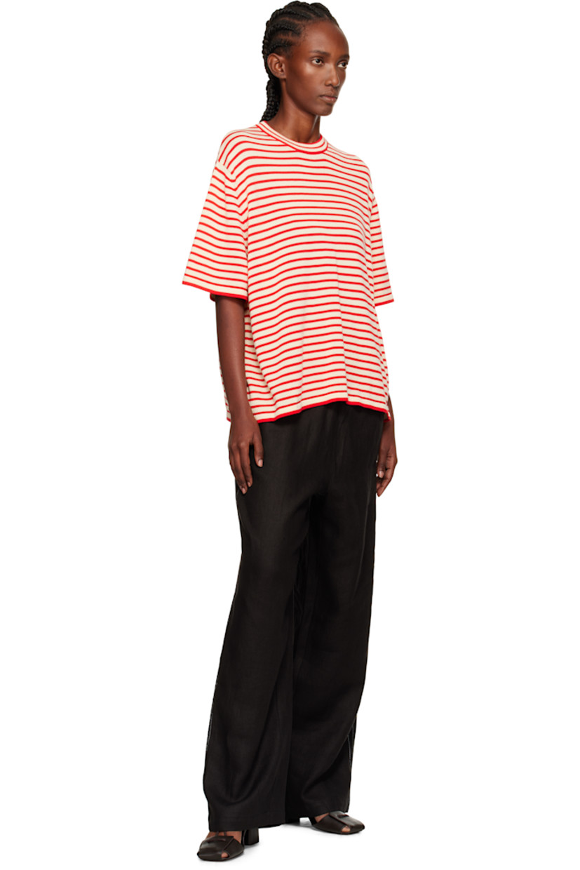 Linen twill trousers.

· Straight-leg
· Elasticized waistband
· Lace trim and contrast stitching at outseams
· Mock pockets at back

Supplier color: Black