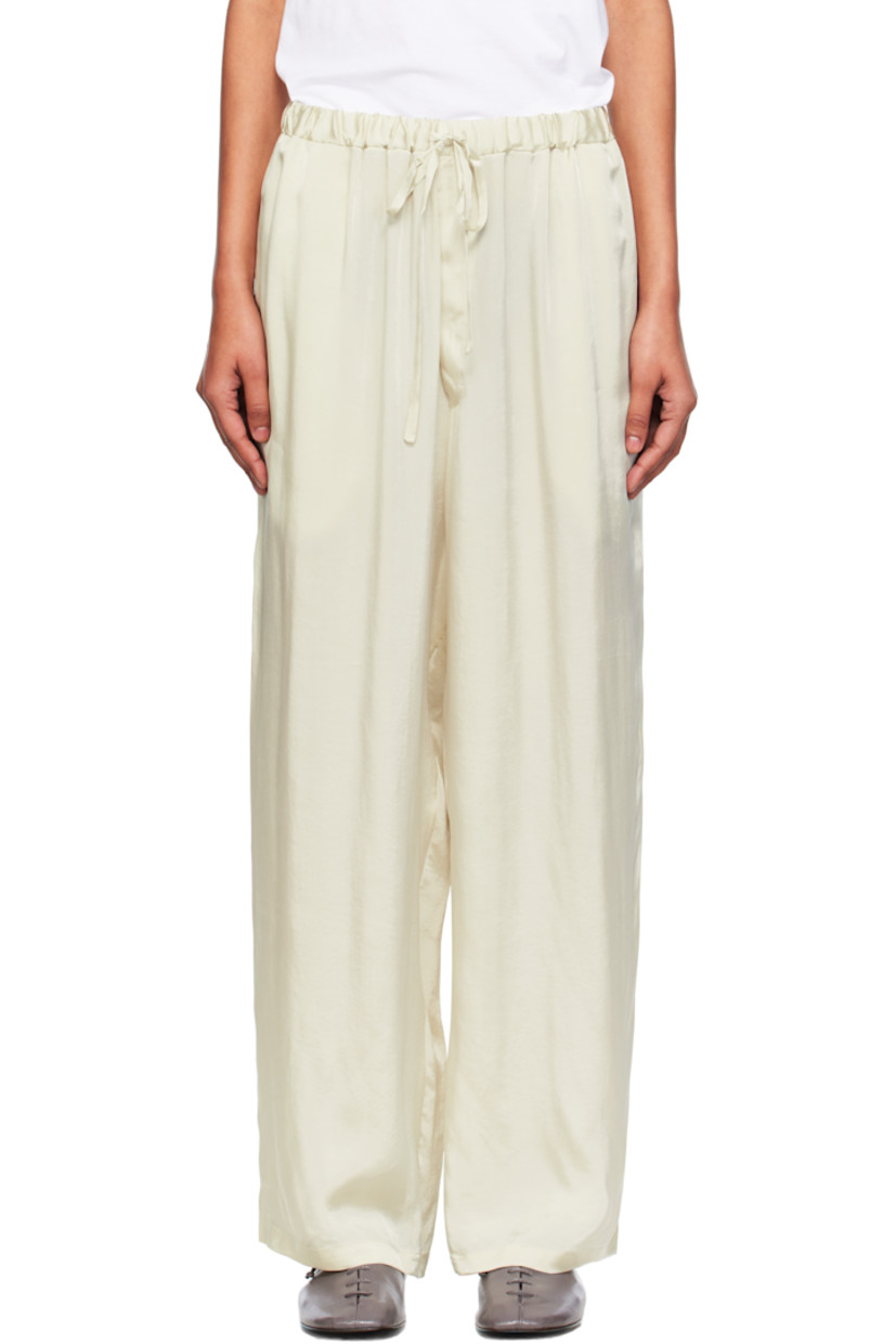 Viscose- and cupro-blend satin trousers.

· Lightweight
· Loose-fit 
· Drawstring at elasticized waistband
· Two-pocket styling

Supplier color: Hielo